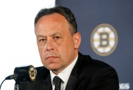 New Bruins coach setting high standards, realistic expectations