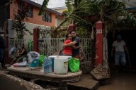 Mexico looks for missing people and rushes to help after torrential rains killed at least 47