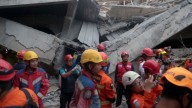 Frantic rush to reach scores of students missing for days after boarding school collapse in Indonesia