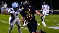 See our best photos from Iowa City Regina vs. Northeast football game