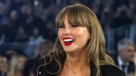 Taylor Swift turns heads in miniskirt and thigh-high boots in sultry outing