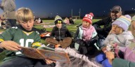 “Literacy under the lights,” Williston student-athletes promote reading with younger kids