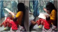 Distressed woman breaks AC coach window after purse theft as child watches on