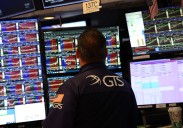 Wall Street hovers near all-time highs with solid performances from top
