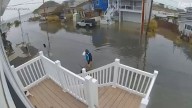 Amazon worker caught on doorbell video delivering package in Lindenhurst, Long Island in middle of nor'easter