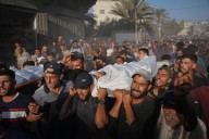 Renewed fighting tests Gaza ceasefire and Israel briefly halts aid