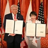 Asian markets cool as Trump hails ties on Japan trip