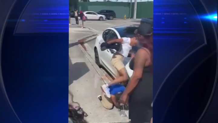Cellphone video captures adult egging on high school students in brutal beatdown at Miami school
