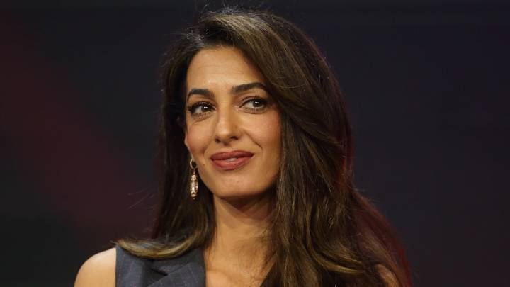 Amal Clooney's black thigh-high boots are an autumn/winter saviour