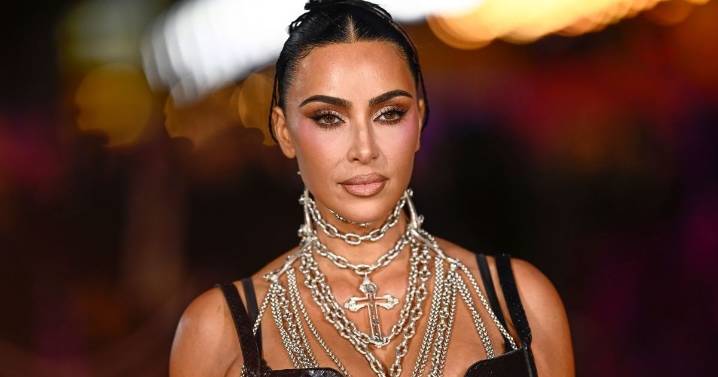Kim Kardashian Wows Fans in Sheer Corset Outfit