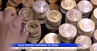 Wall Street edges back from its records after gold tops $4,000 per ounce