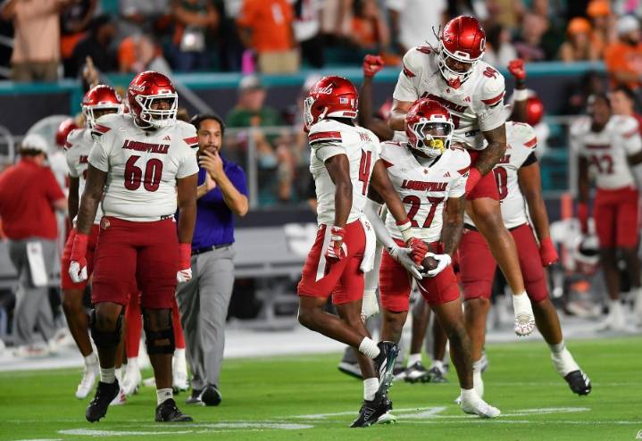 Louisville intercepts 4 of Beck's passes, tops No. 2 Miami 24-21 to end Hurricanes' home streak