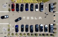 Parents of college student killed in Tesla crash allege design flaw trapped her in the burning car