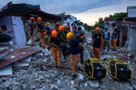 Rescuers desperately search for survivors after a powerful earthquake hit the Philippines, killing at least 69