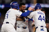 Dodgers outlast Phillies in 11 innings, advance to NLCS