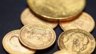 US stock market opens shaky with gold drop, Netflix earnings miss