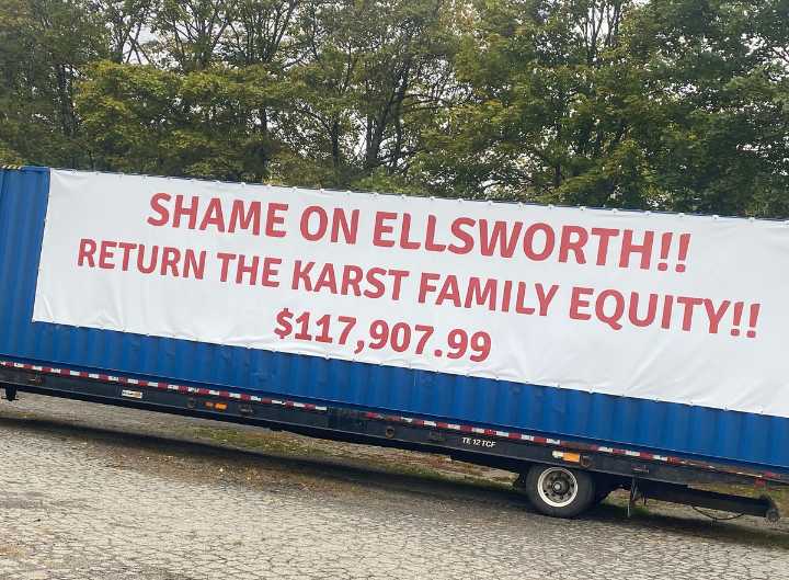 Ellsworth councilor cited for his large banner criticizing the city
