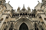 Migrants lose late-night High Court bids to block removal to France