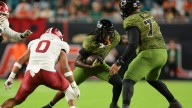 State college football wrapup. Miami hammers Stanford, USF falls