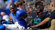 NFL legend Larry Fitzgerald weighs in on grass vs turf debate