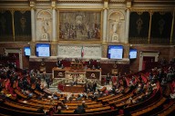 France steps back from the brink as parliament spares the prime minister. For now
