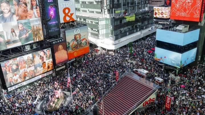 'No Kings' protests take place across US, bringing a street party vibe