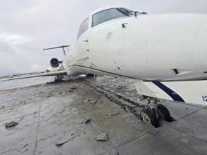 Plane overshoots runway at Virginia airport during heavy rain