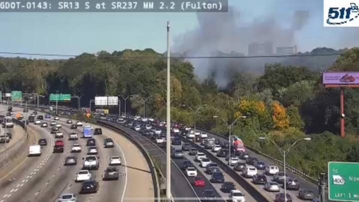 Brush fire near Buford Spring Connector causes traffic delays, closes right lane