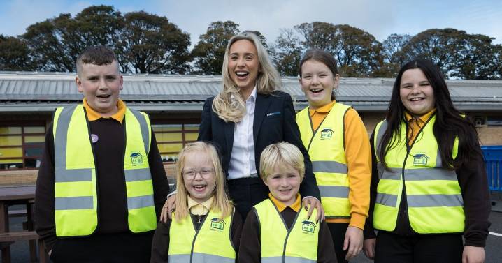 Ayrshire school kids given high vis vests to make journeys to school safer