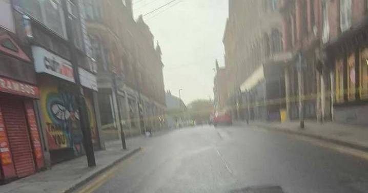 Police tape off Northern Quarter street with man rushed to hospital