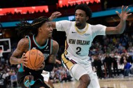 Morant scores 35 points, Memphis uses a third-quarter rally to beat New Orleans 128