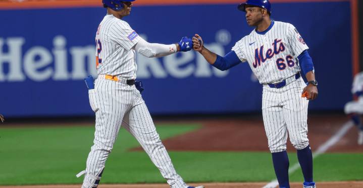 First Base Coach Antoan Richardson leaving Mets