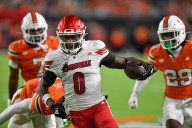 Louisville intercepts 4 of Beck's passes, tops No. 2 Miami 24-21 to end Hurricanes' home streak