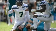 Seahawks rediscover their pass rush as they remain unbeaten on the road