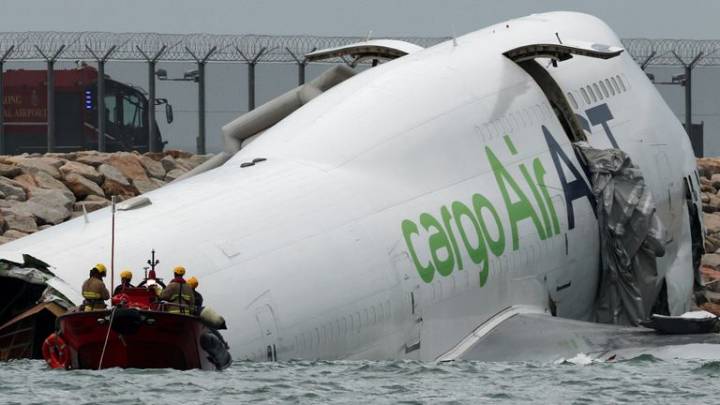 Cargo plane slides off runway in Hong Kong 
