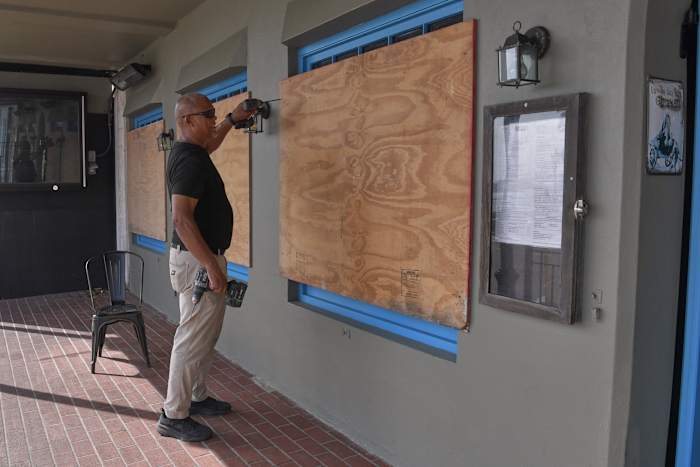 Imelda descends on Bermuda as Category 2 hurricane with damaging wind and waves