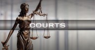 Courts: Troopers find two rifles, tear gas and brass knuckles in convicted felon's truck