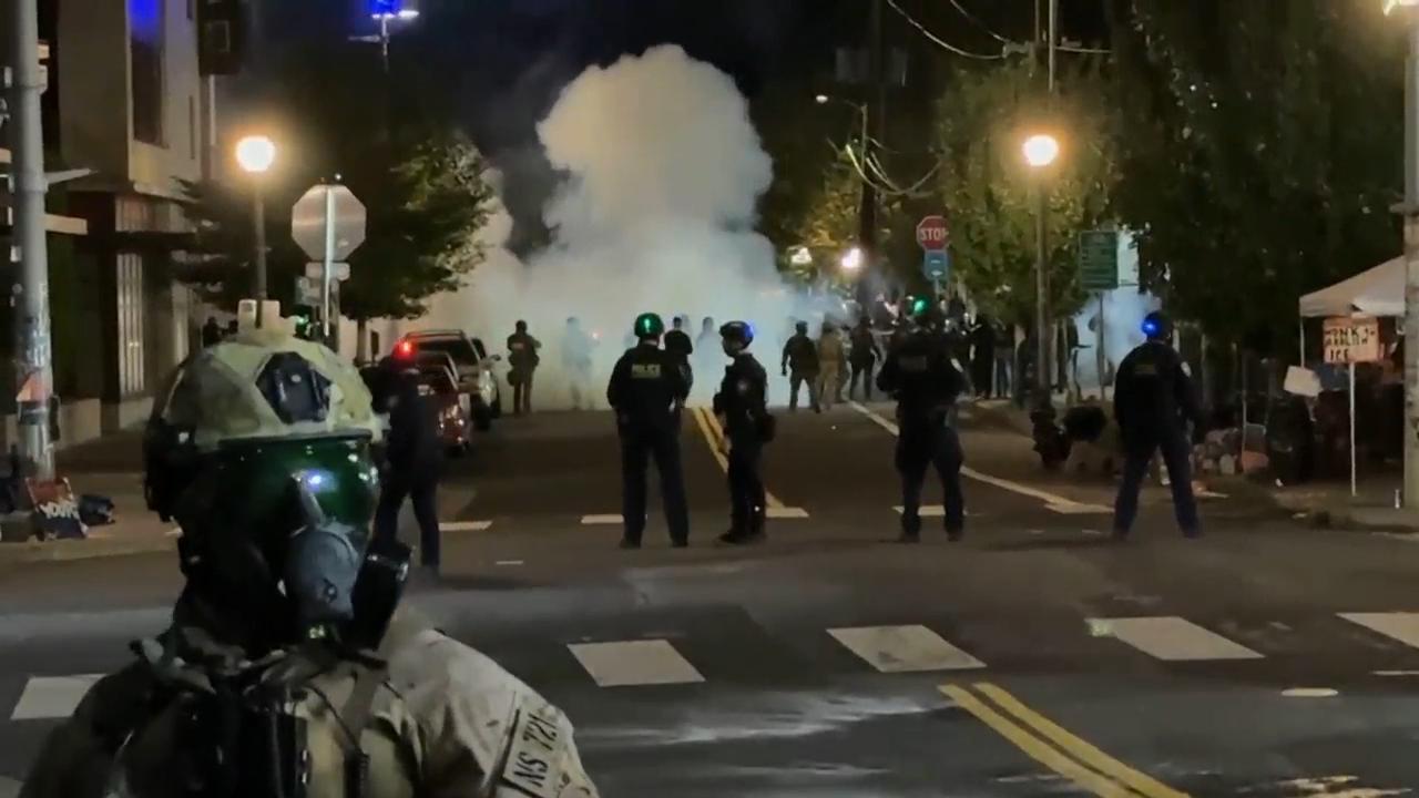 Protesters gather in Portland as city braces for arrival of federal troops