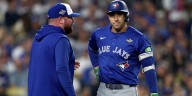 George Springer exits World Series Game 3 after swing