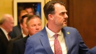 Why Gov. Kevin Stitt is suing to block a new law he vetoed