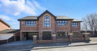Inside dream Greater Manchester house with its own bar and stunning garden selling for £1 million