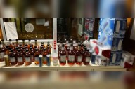 Two men charged after attempting to smuggle 126 bottles, cans of alcohol