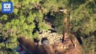 Woman injured after army truck collision north