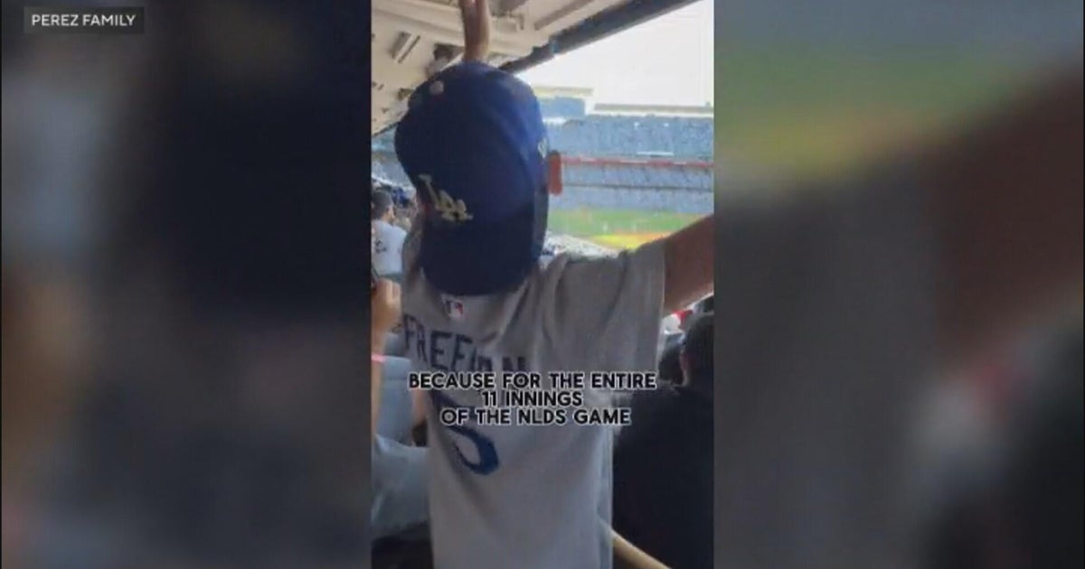Young fan relentlessly cheers on Dodgers during NLDS thriller