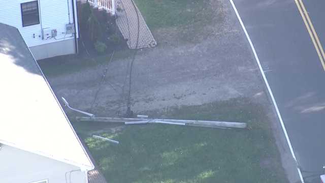 2 utility poles down on Medford street, shutting off power to nearby homes