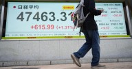 Wall Street drifts lower in mixed trading