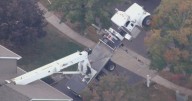 Crane moving hot tub topples over onto home in Hamilton Township, New Jersey