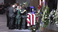 Family, law enforcement and community honors Iberville Parish Dept. Charles Riley at funeral