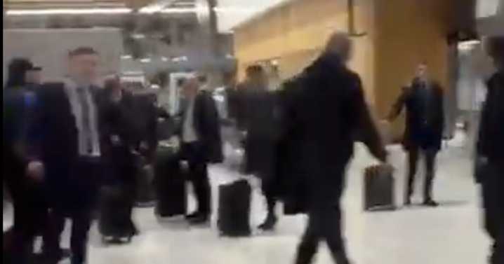 Stewart and Thelwell confronted as furious Rangers fans held back by security during airport altercation