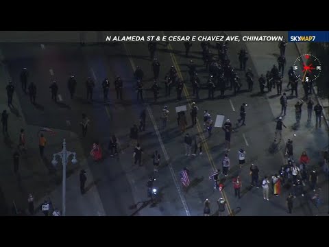 Lingering protesters face off with LAPD hours after 'No Kings' event